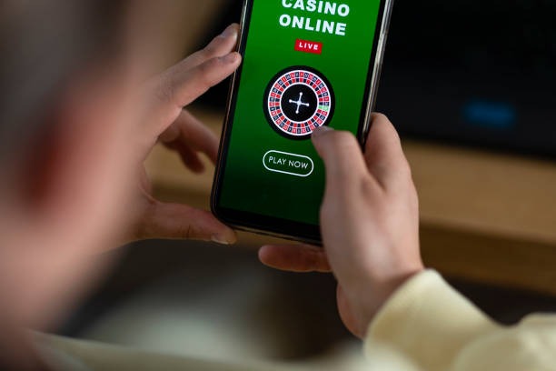 Mobile phone displaying angkasa186 baccarat table interface with betting positions and balance display
